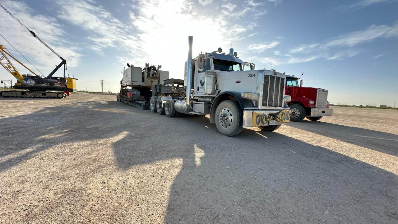 Rhino Peterbilt hauling crane